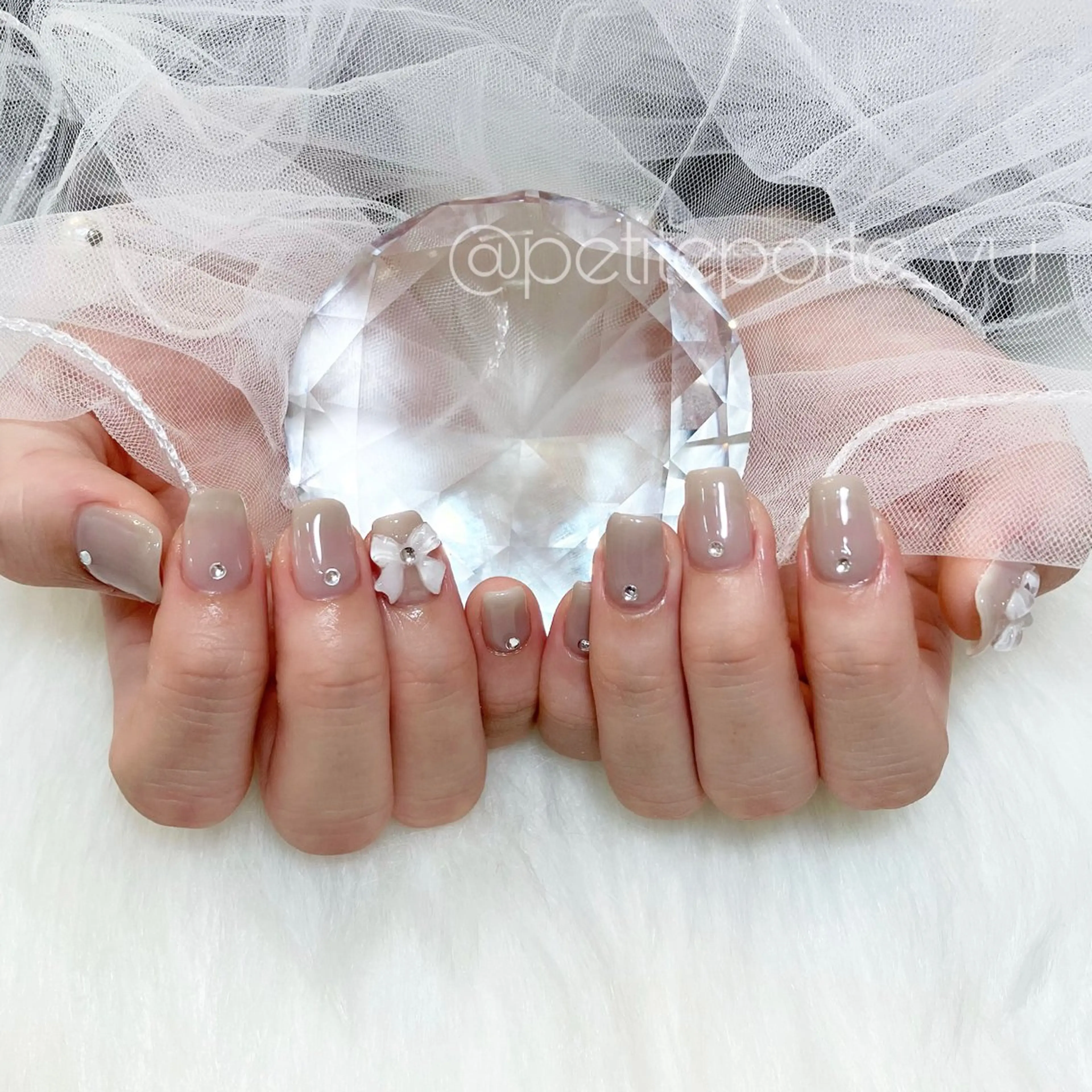 ネイル ボルドー クリアネイル ガーリー リボン ストーンネイル ハンドネイル nailsalon petite porte所属・petite porteのネイルデザイン