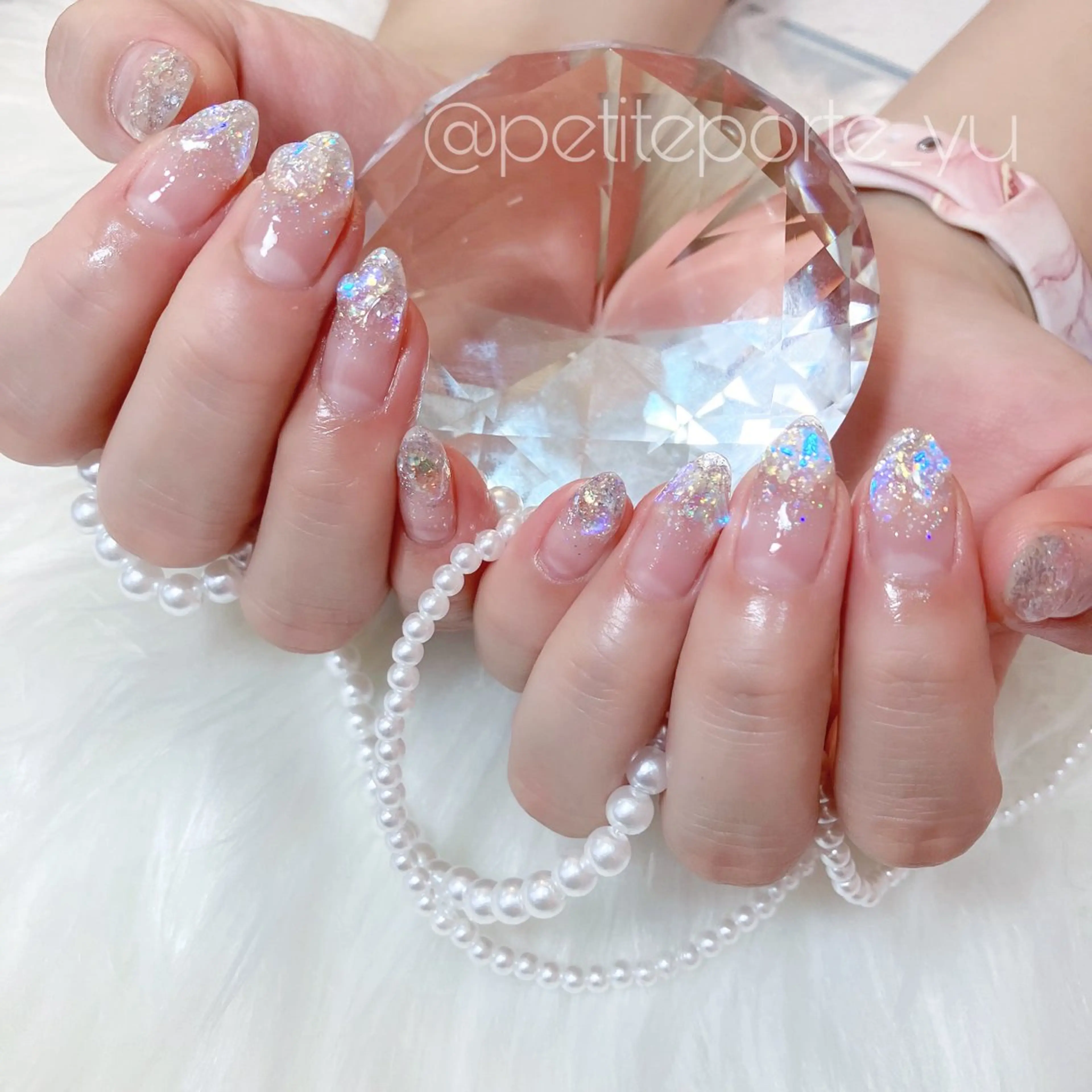 ネイル オーロラネイル クリアネイル ラメ(グリッター) ストーンネイル ハンドネイル nailsalon petite porte所属・petite porteのネイルデザイン