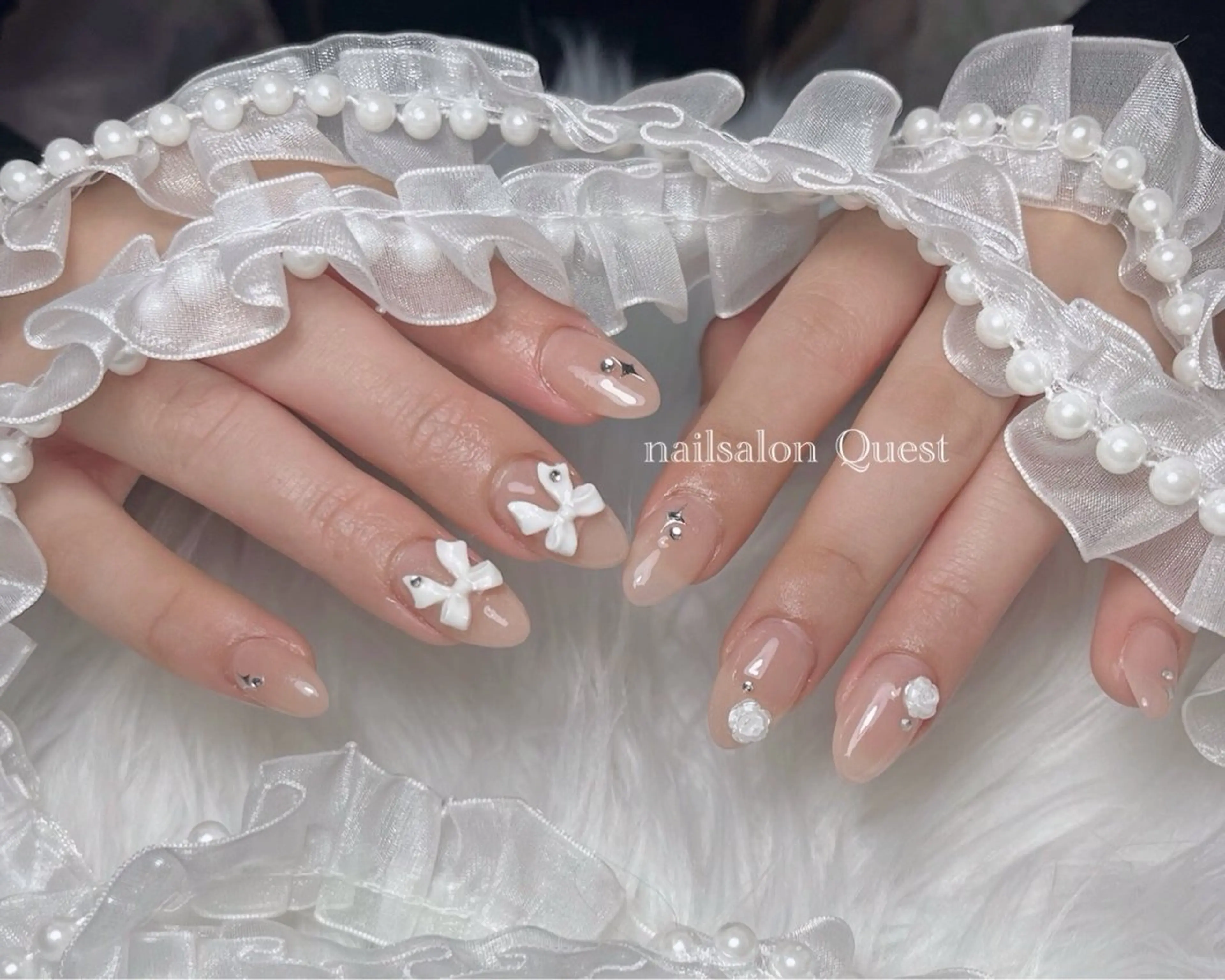 ネイル 長さ出し ガーリー リボン ハンドネイル nailsalon Questのネイルデザイン