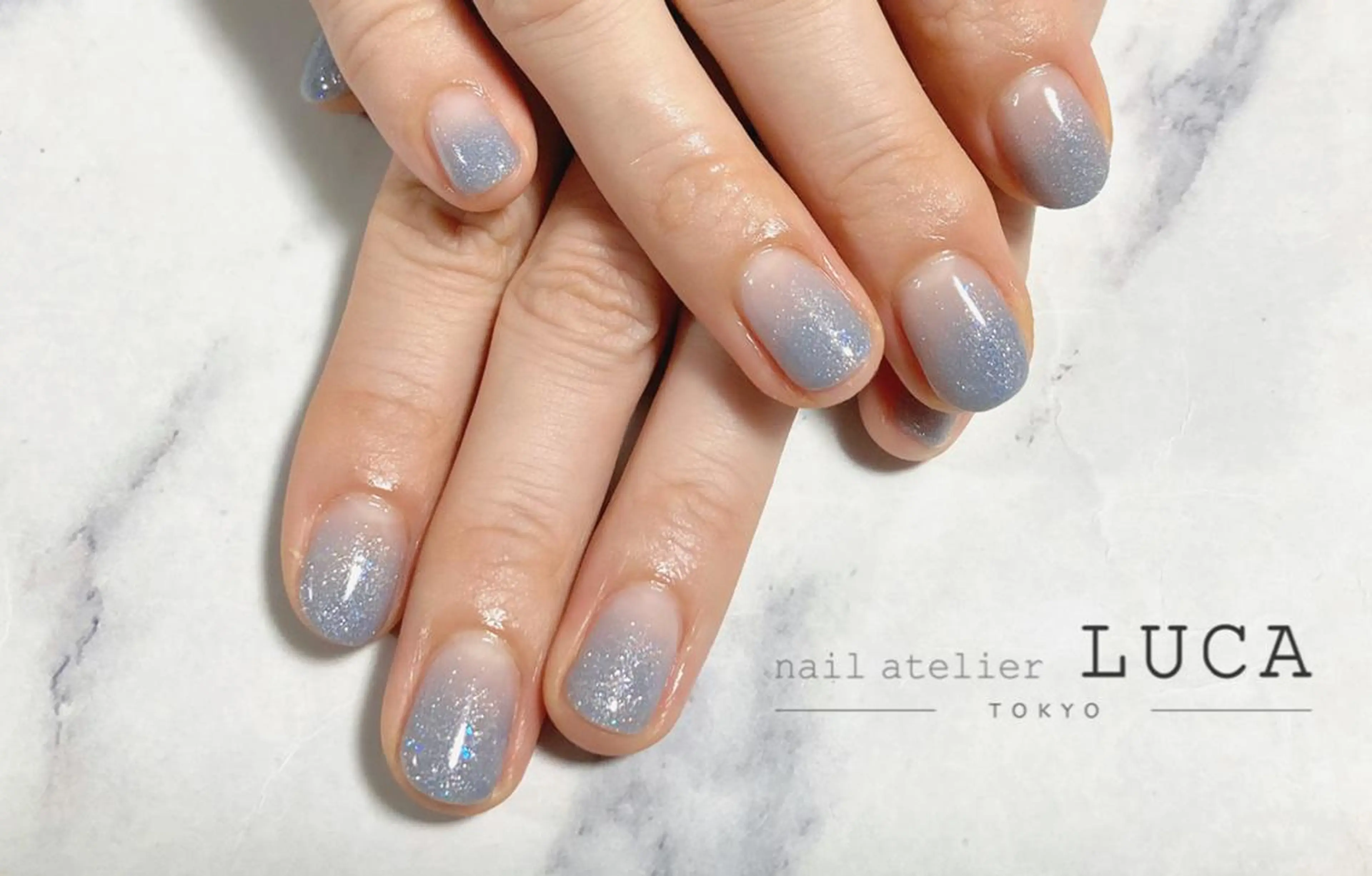 ネイル ジェルネイル グラデーション ラメ(グリッター) ラメグラデーション 水色 ネイルアトリエルカ スタッフのネイルデザイン
