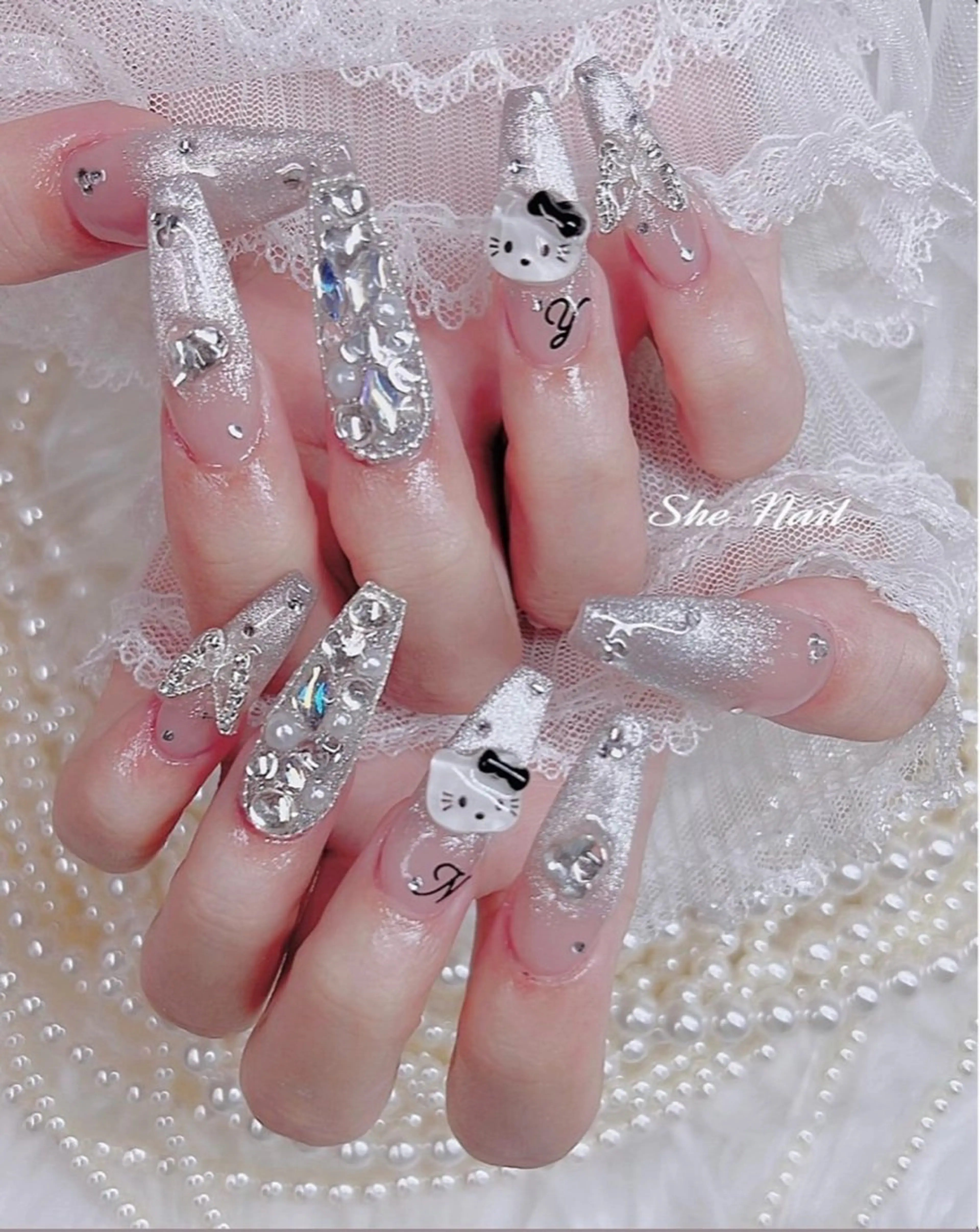 ネイル チークネイル 長さ出し フレンチネイル ガラスフレンチ キラキラネイル ハンドネイル She_nail所属・ELSA_ Bellaのネイルデザイン