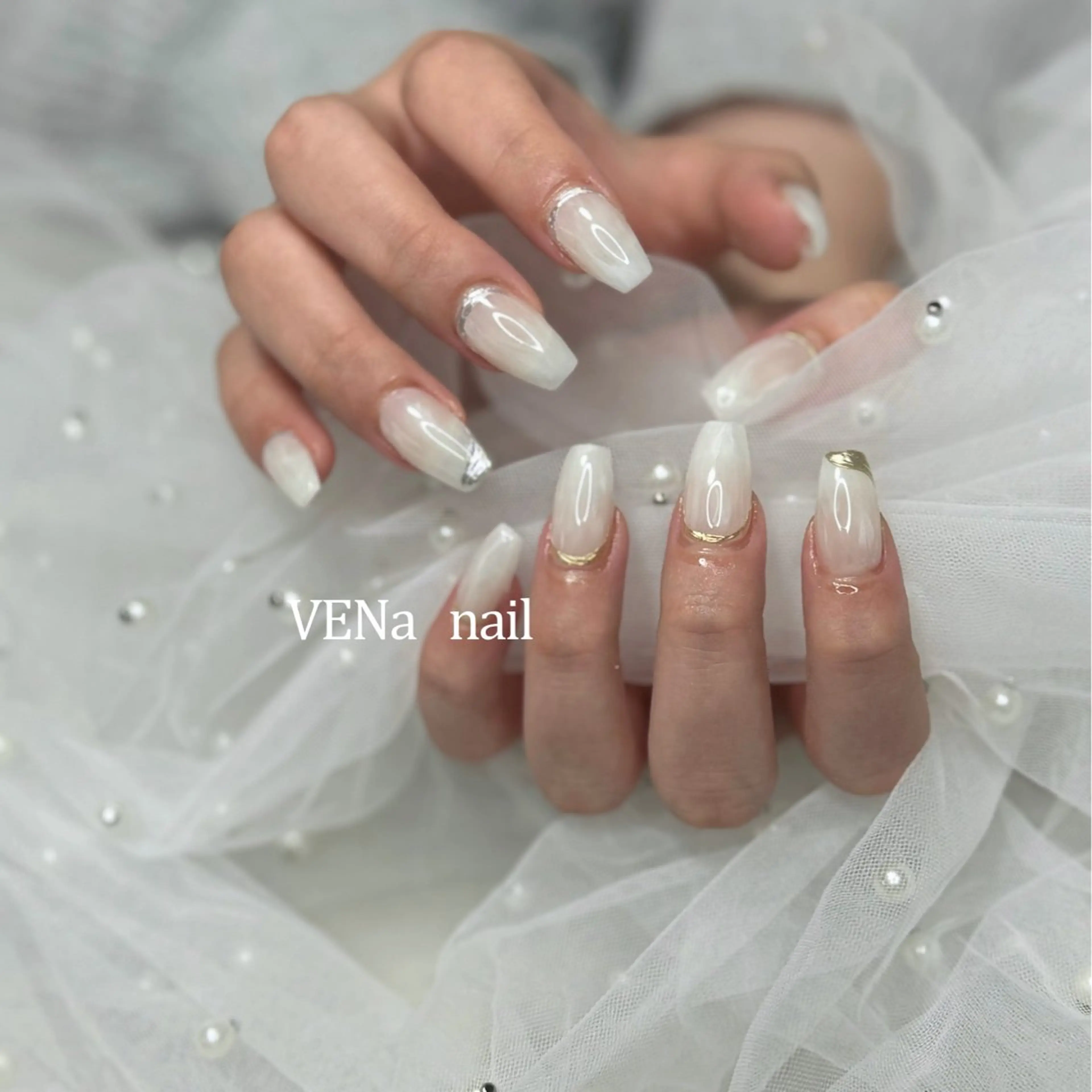 ネイル マグネットネイル 持ち込み ホワイト 冬ネイル VENa eye＆ nail salonのネイルデザイン