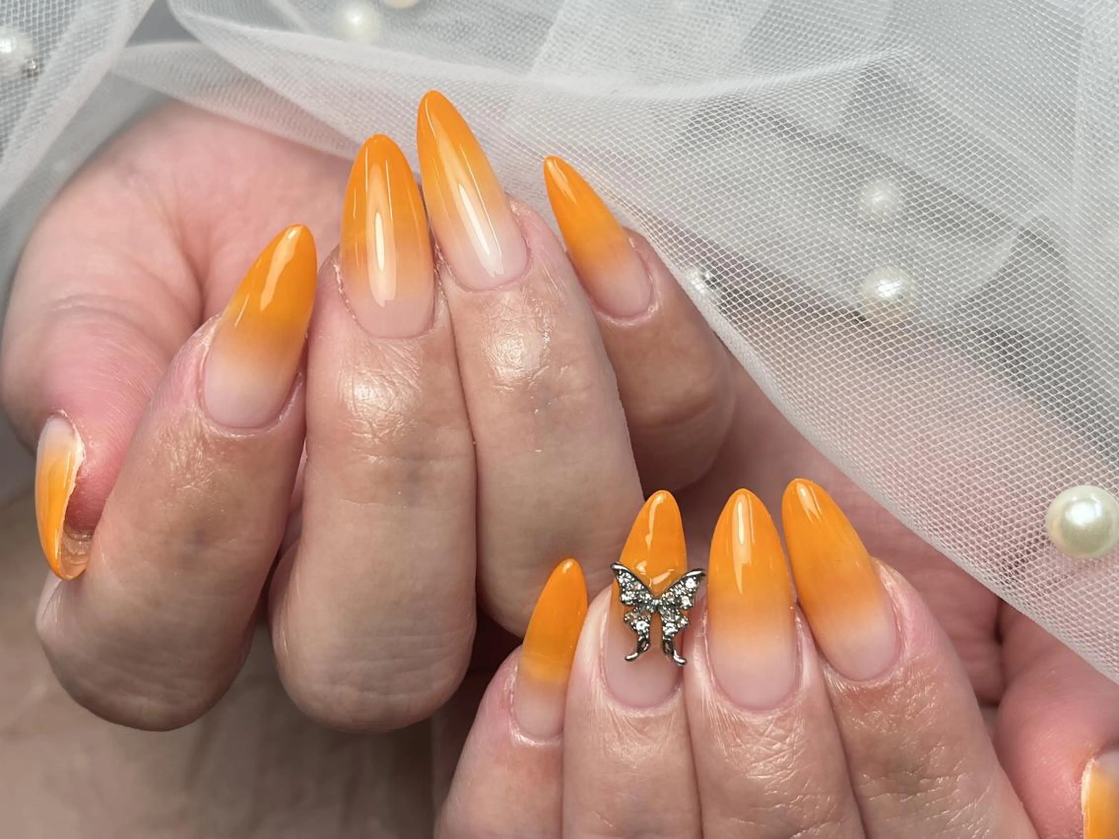 ネイル グラデーション キラキラネイル オレンジ ハンドネイル ToliyDeliy Nail Salonのネイルデザイン
