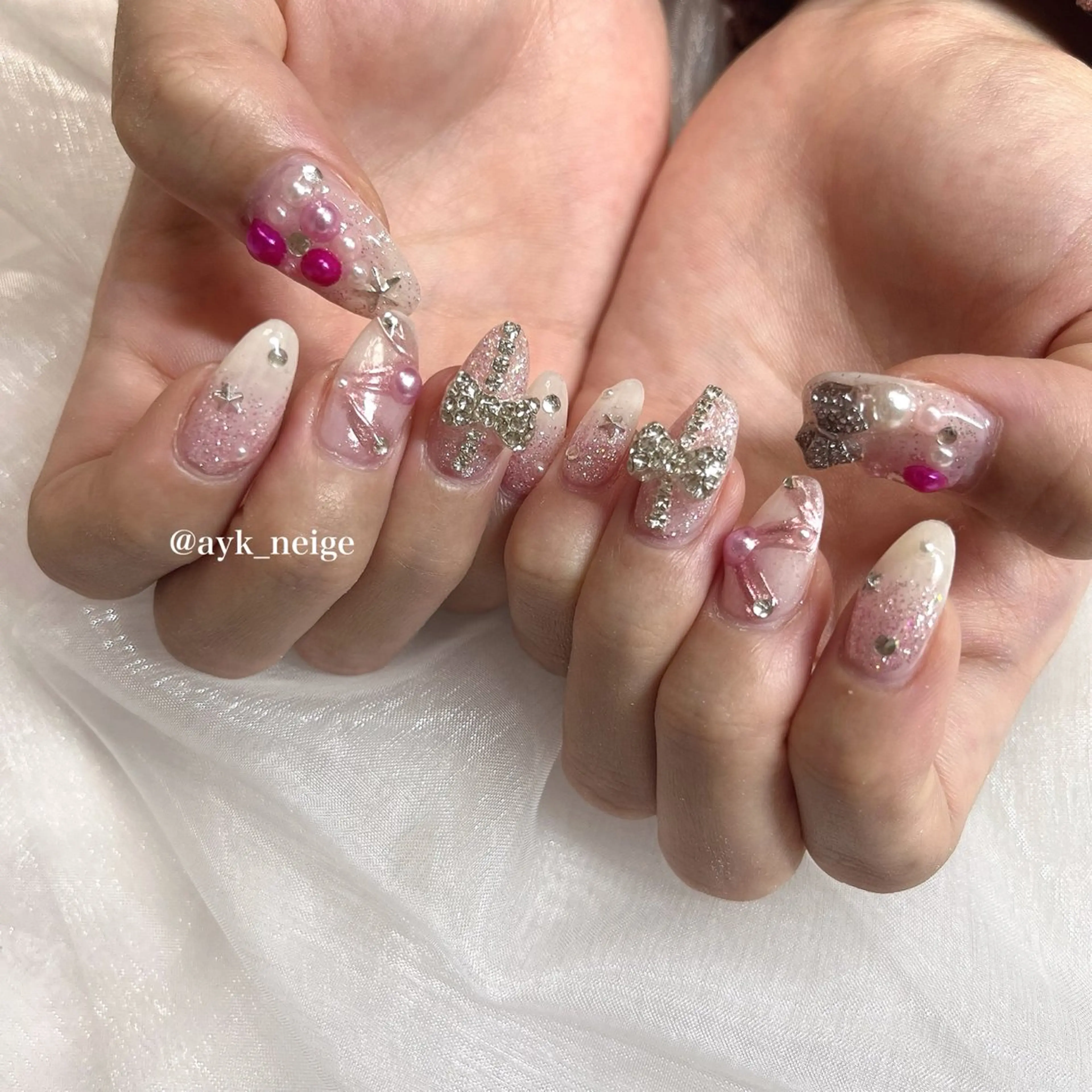 ネイル フットネイル キラキラネイル 韓国ネイル リボン n'eige nail所属・大谷 綾香のネイルデザイン