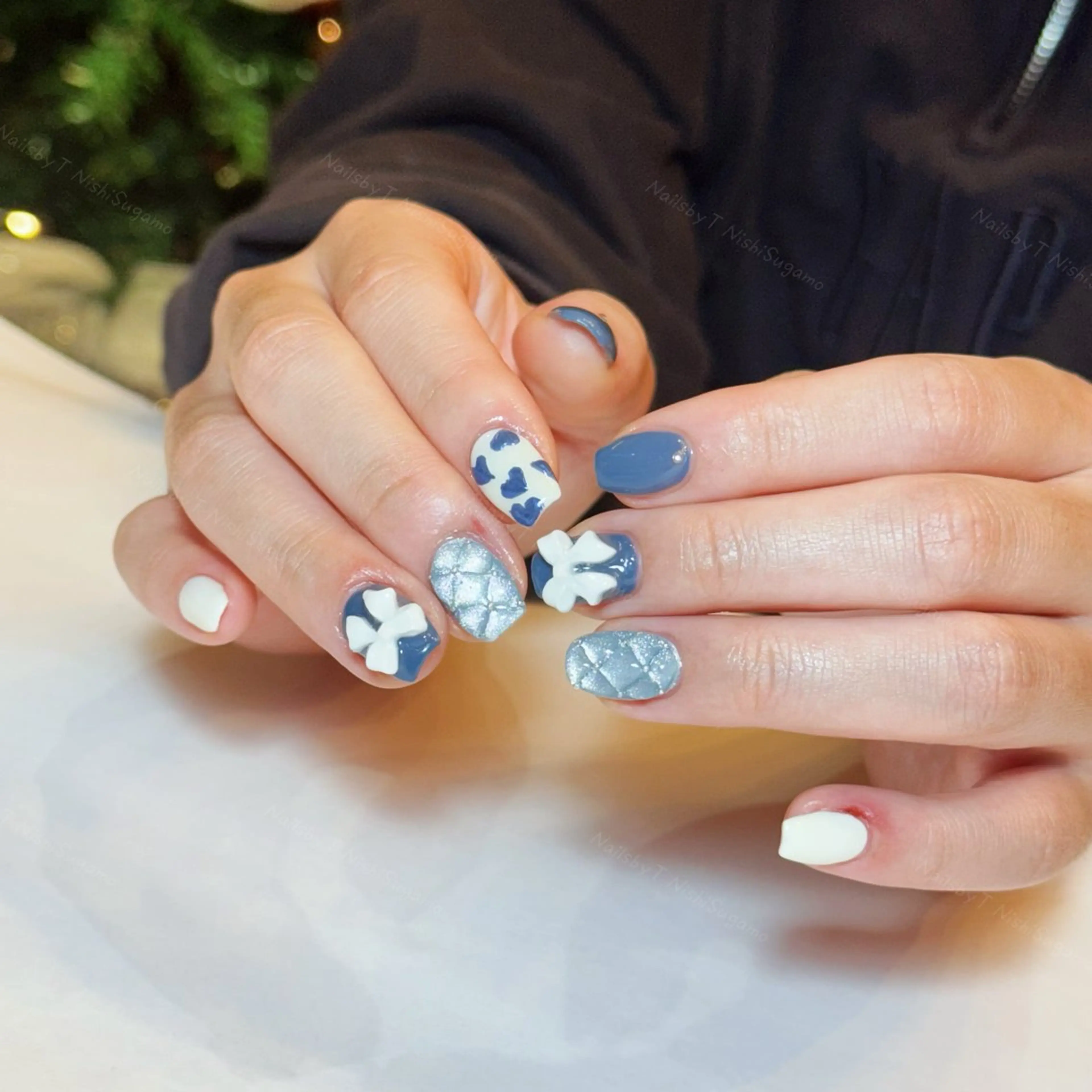 ネイル キラキラネイル リボン ハンドネイル NailsbyT N.Sugamoのネイルデザイン