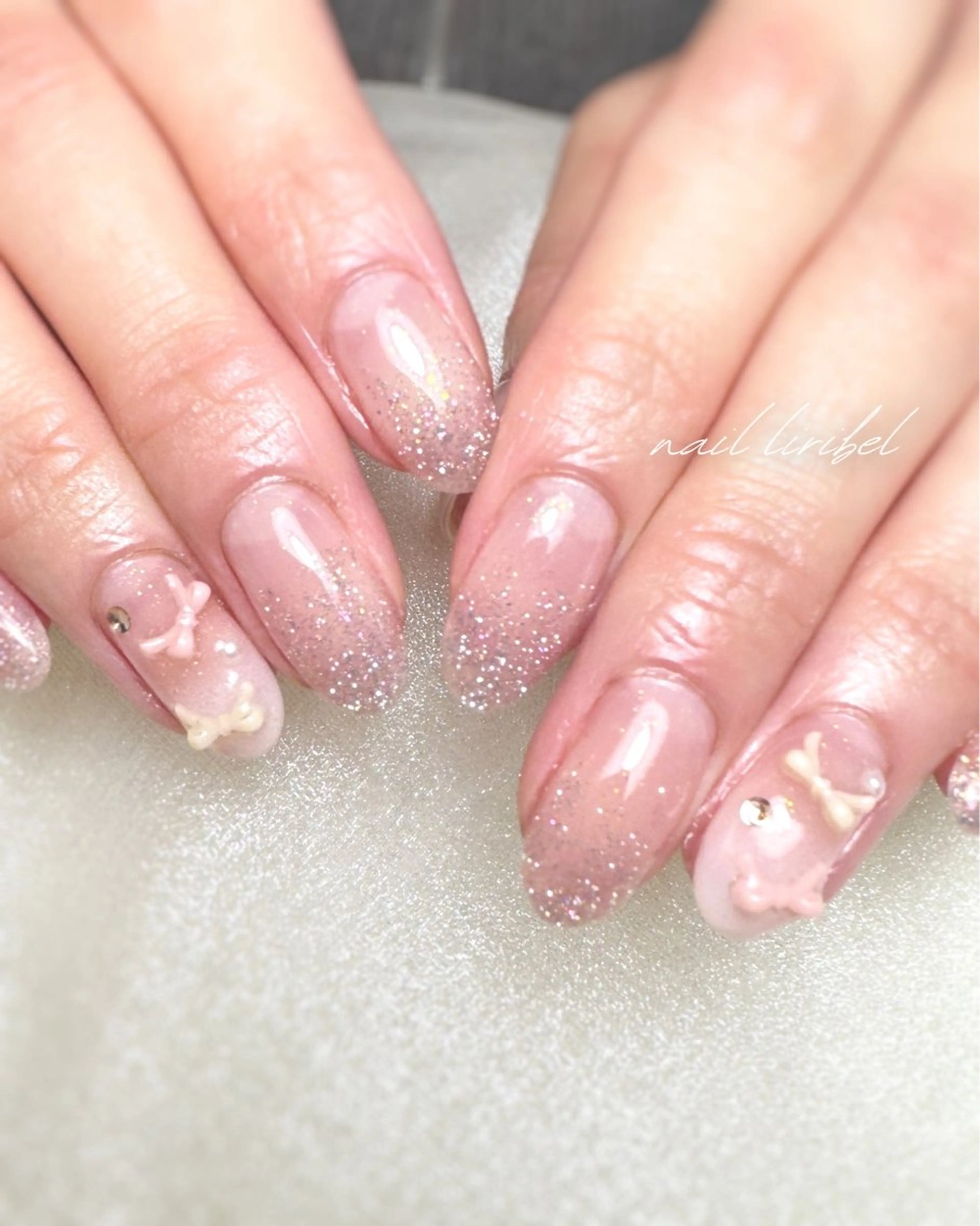 ネイル フラッシュネイル フラッシュマグ ジェルネイル キラキラネイル リボン ハンドネイル Nail Liribelのネイルデザイン