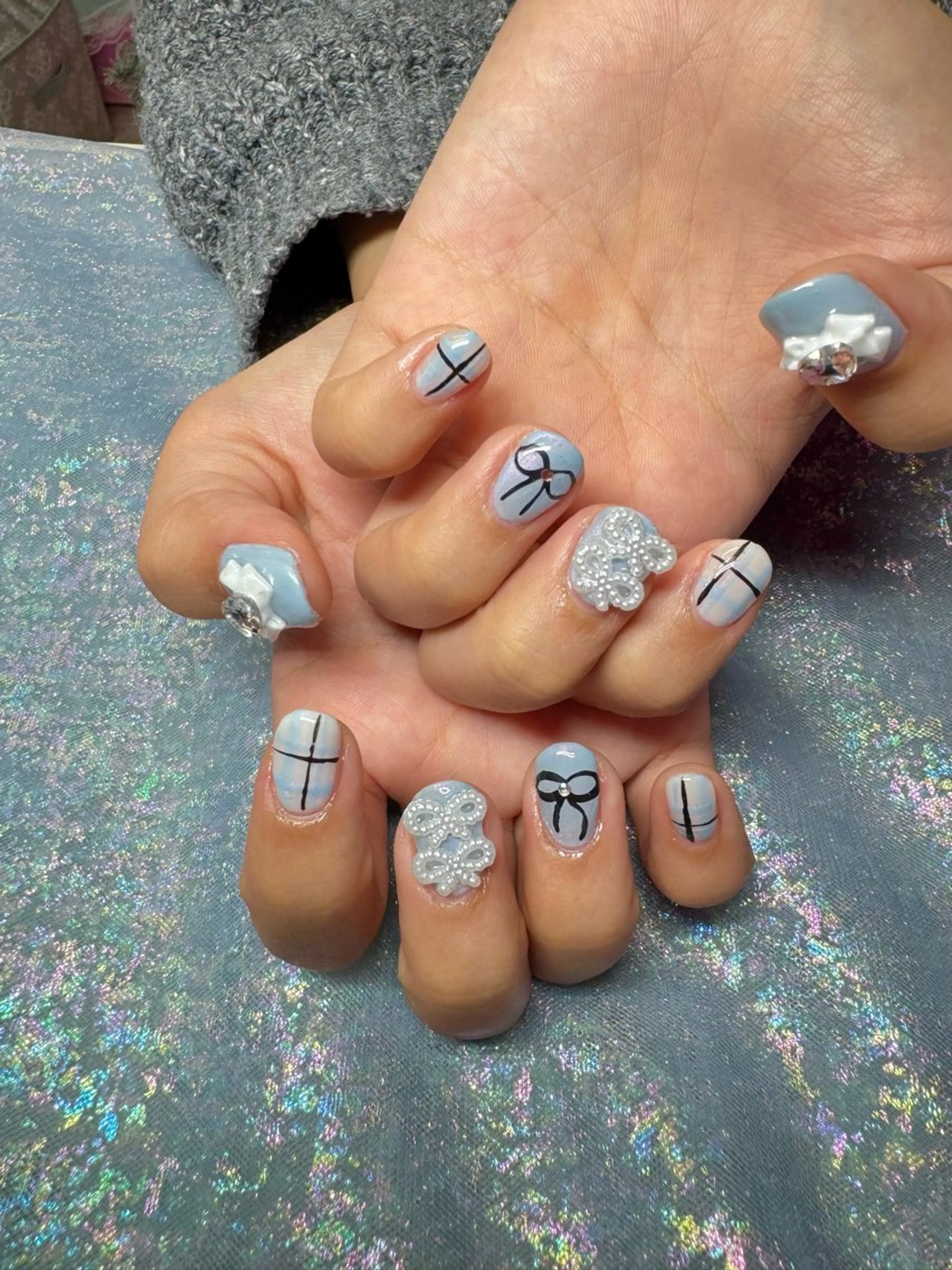 ネイル リボン nail spaß所属・WAKALU .のネイルデザイン