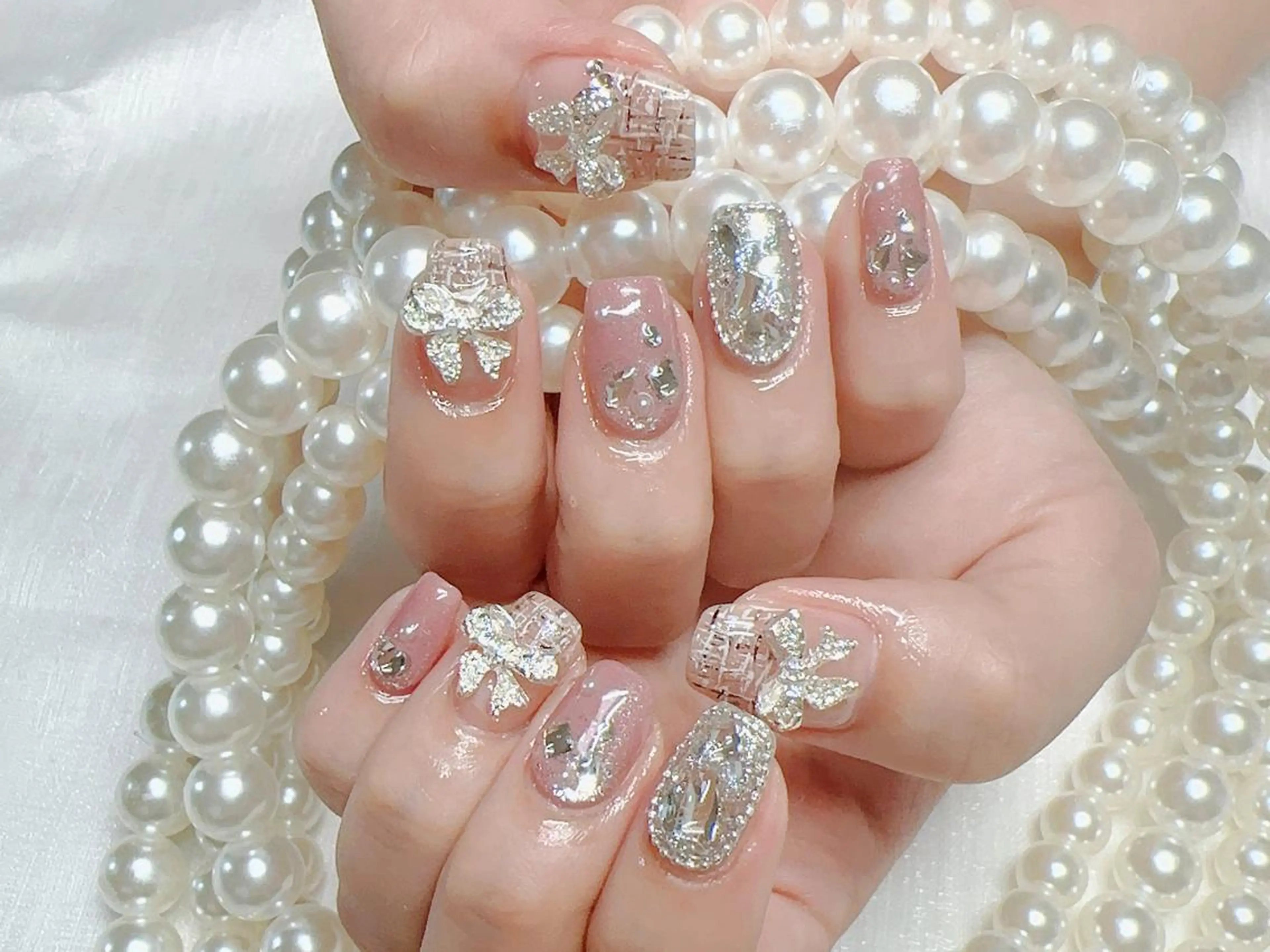 ネイル オーロラネイル 長さ出し フレンチネイル ガーリー キラキラネイル ハンドネイル Lucky nail salonのネイルデザイン