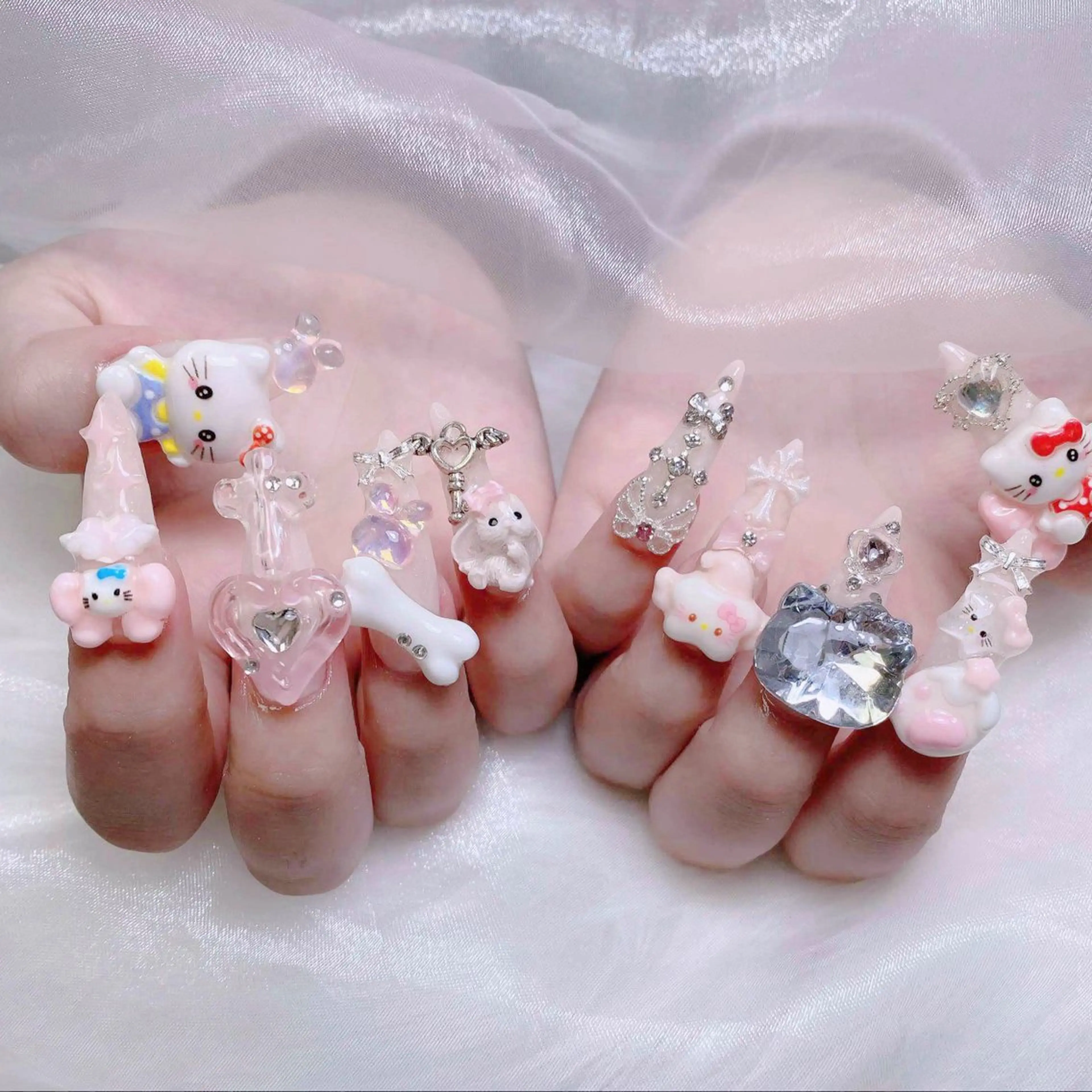 ネイル 成人式 ロングネイル マグネットネイル 大理石ネイル(マーブル) リボン ハンドネイル Momoa nail salon所属・MoMoA Nail ネイル長さ出し専門店のネイルデザイン