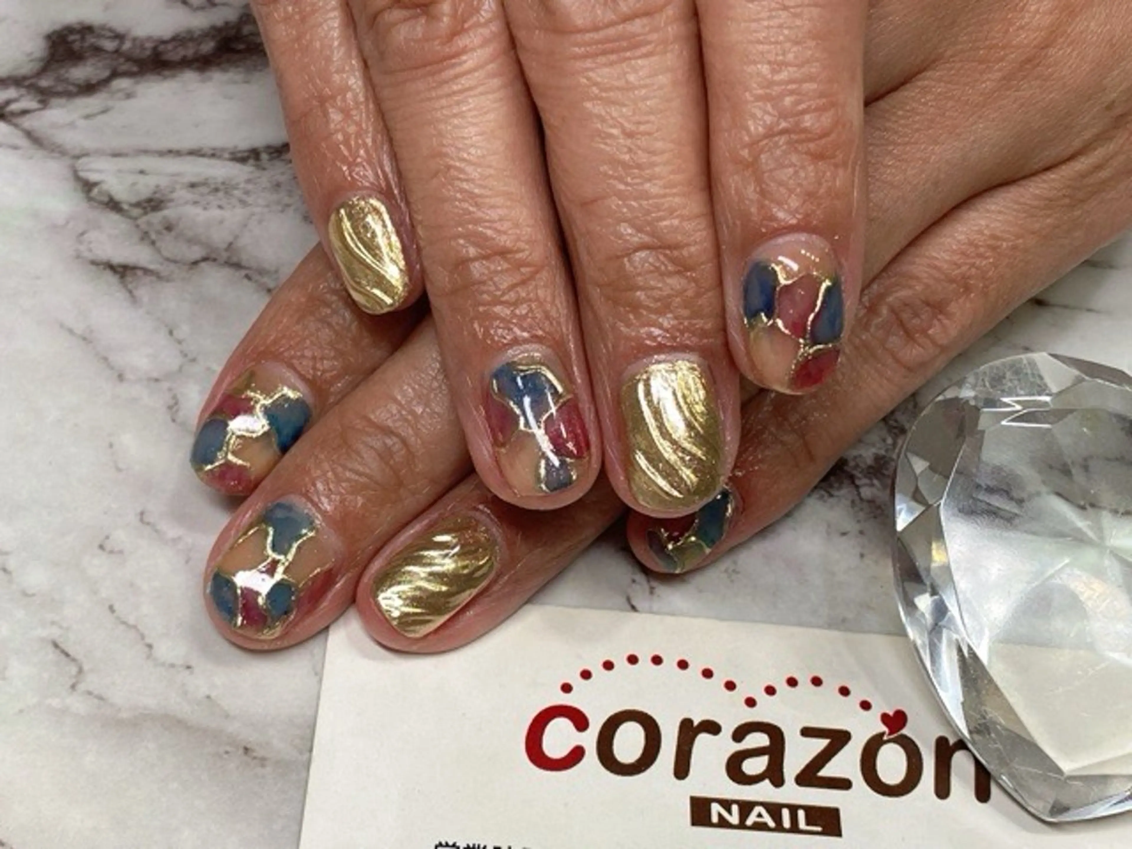 ネイル アートネイル ブルー 赤色 黄色 corazon所属・ネイリスト aicoのネイルデザイン