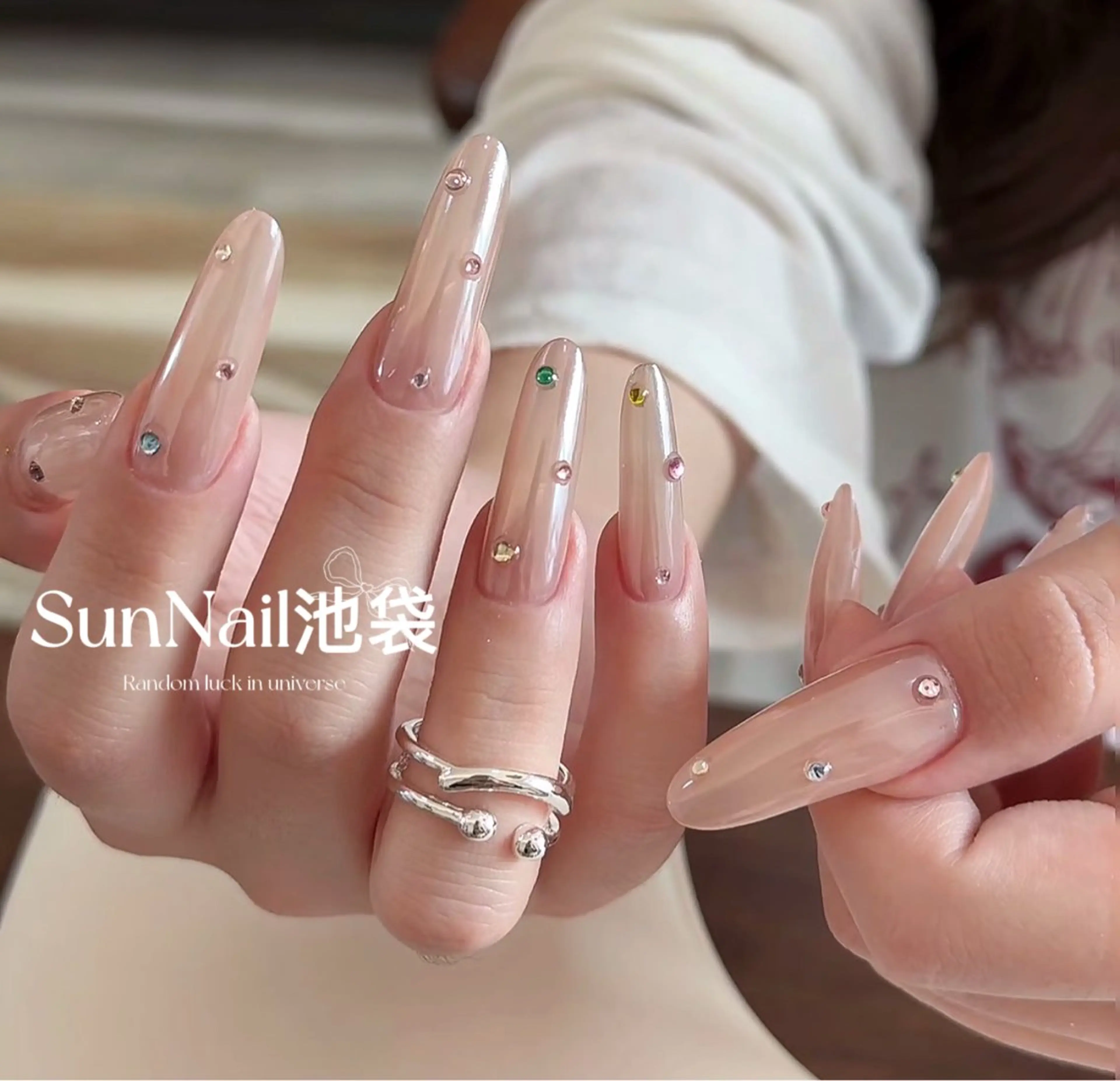 ネイル チークネイル 長さ出し フラワーネイル フレンチネイル ガーリー ハンドネイル ハンドケア Sun Nail 池袋のエステ・リラクイメージ