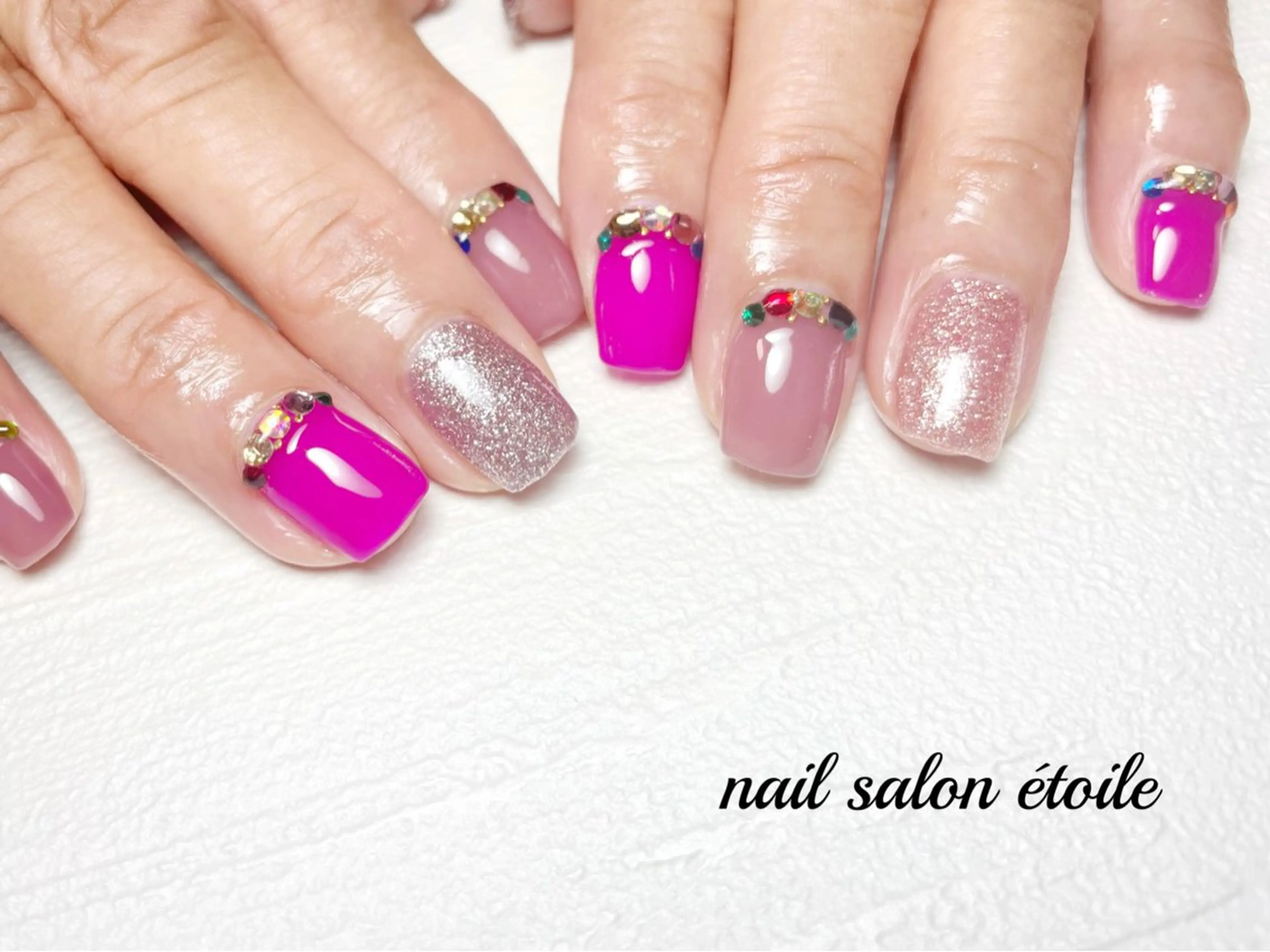 ネイル キラキラネイル ラメ(グリッター) ピンク パープル ストーンネイル ハンドネイル nail salon étoileのネイルデザイン