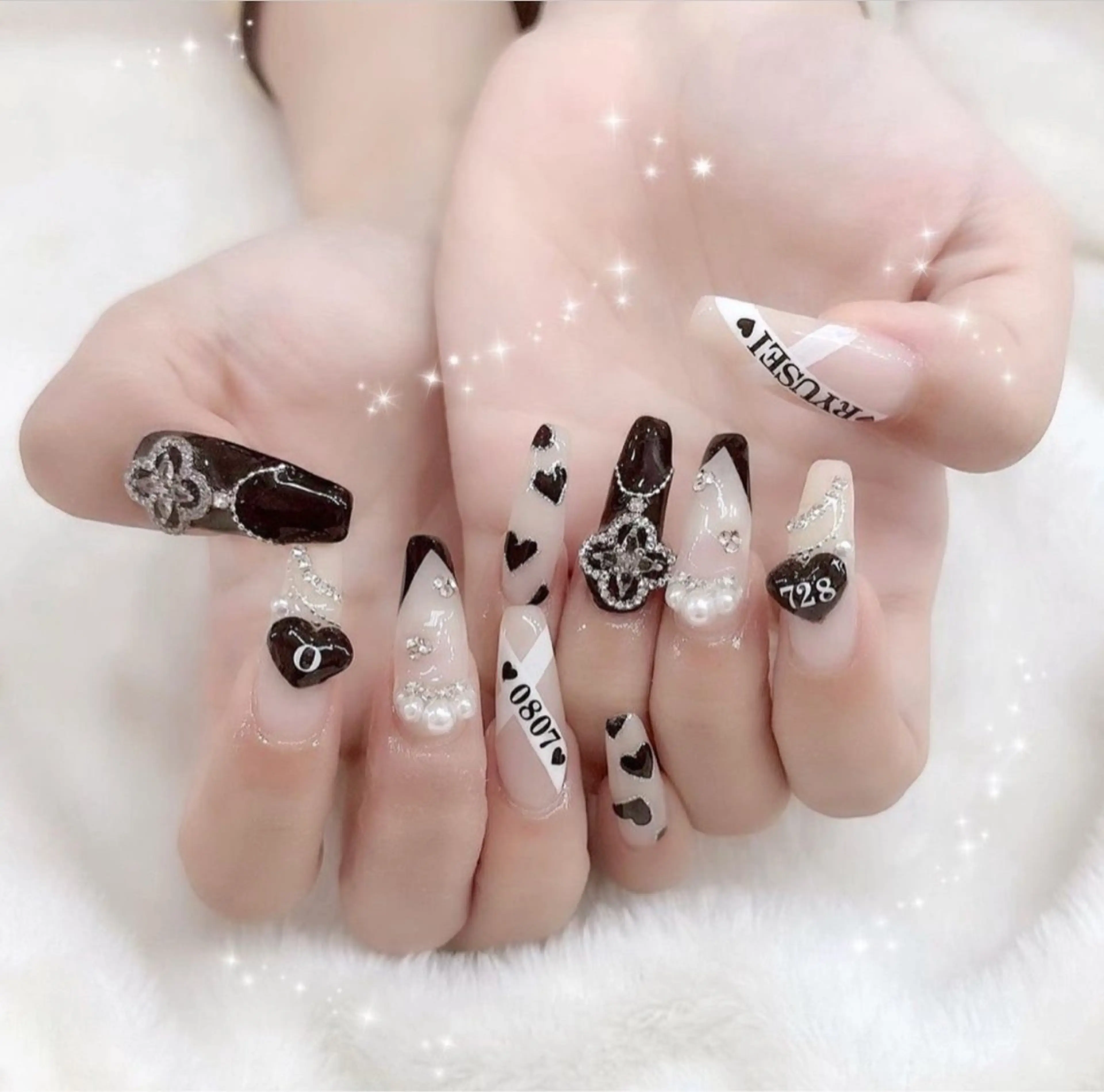 ネイル 成人式 ロングネイル マグネットネイル 大理石ネイル(マーブル) リボン ハンドネイル Amee Nailsalon所属・Amee Nailsalonのネイルデザイン