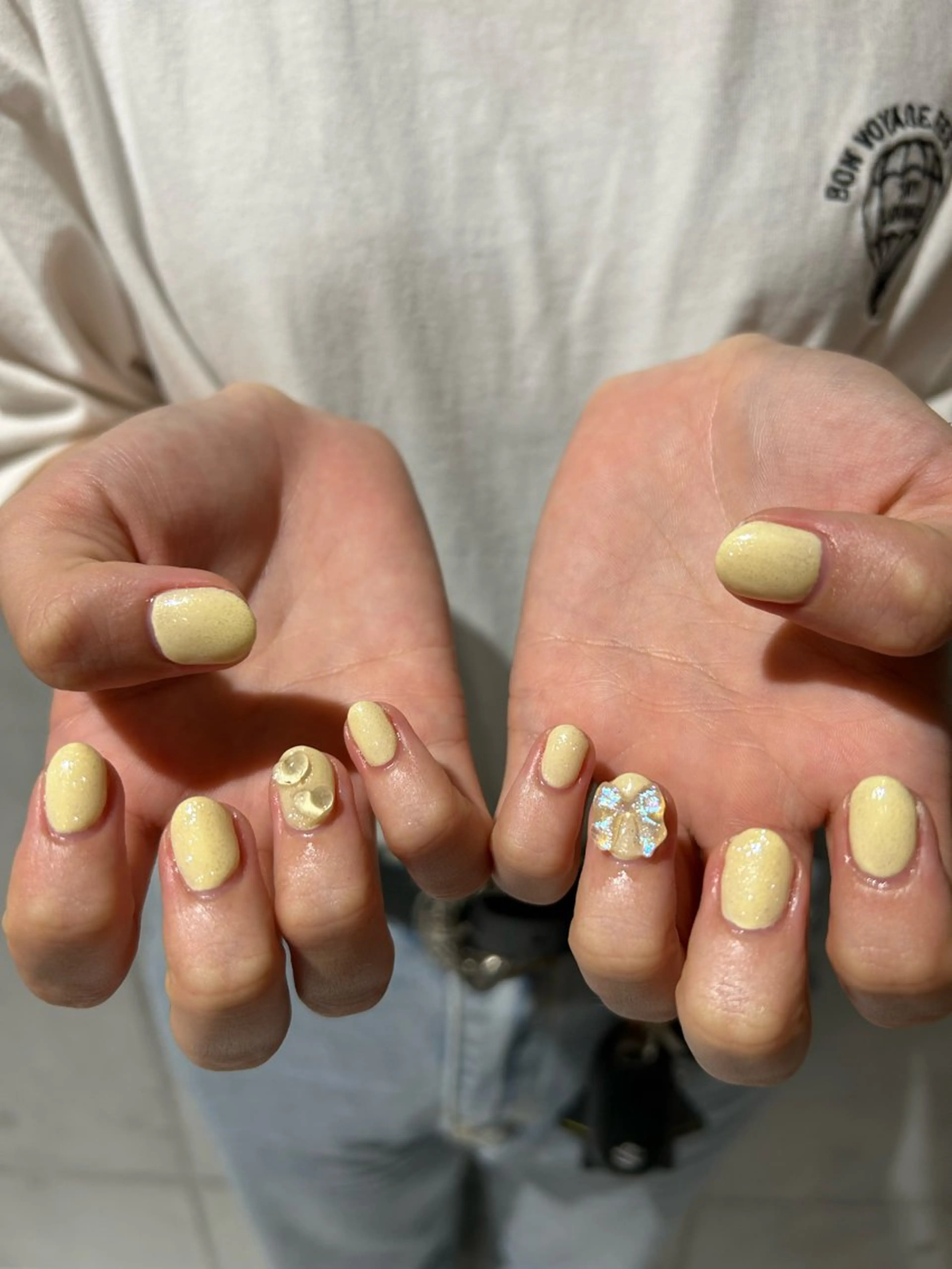 ネイル パステルネイル リボン 黄色 大山 なつみのネイルデザイン