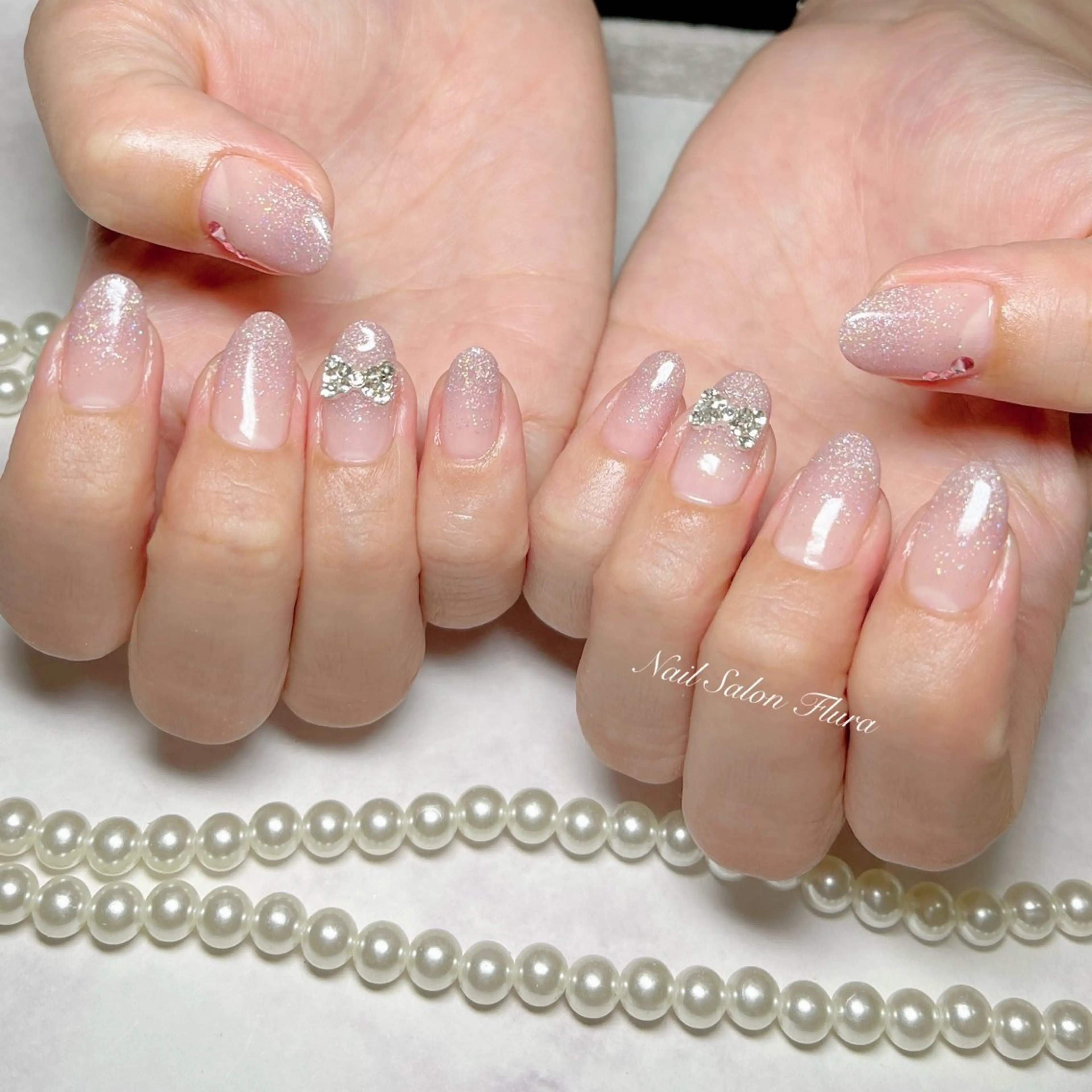 ネイル グラデーション リボン ハンドネイル NAILSALON Flura所属・NailSalon Fluraのネイルデザイン