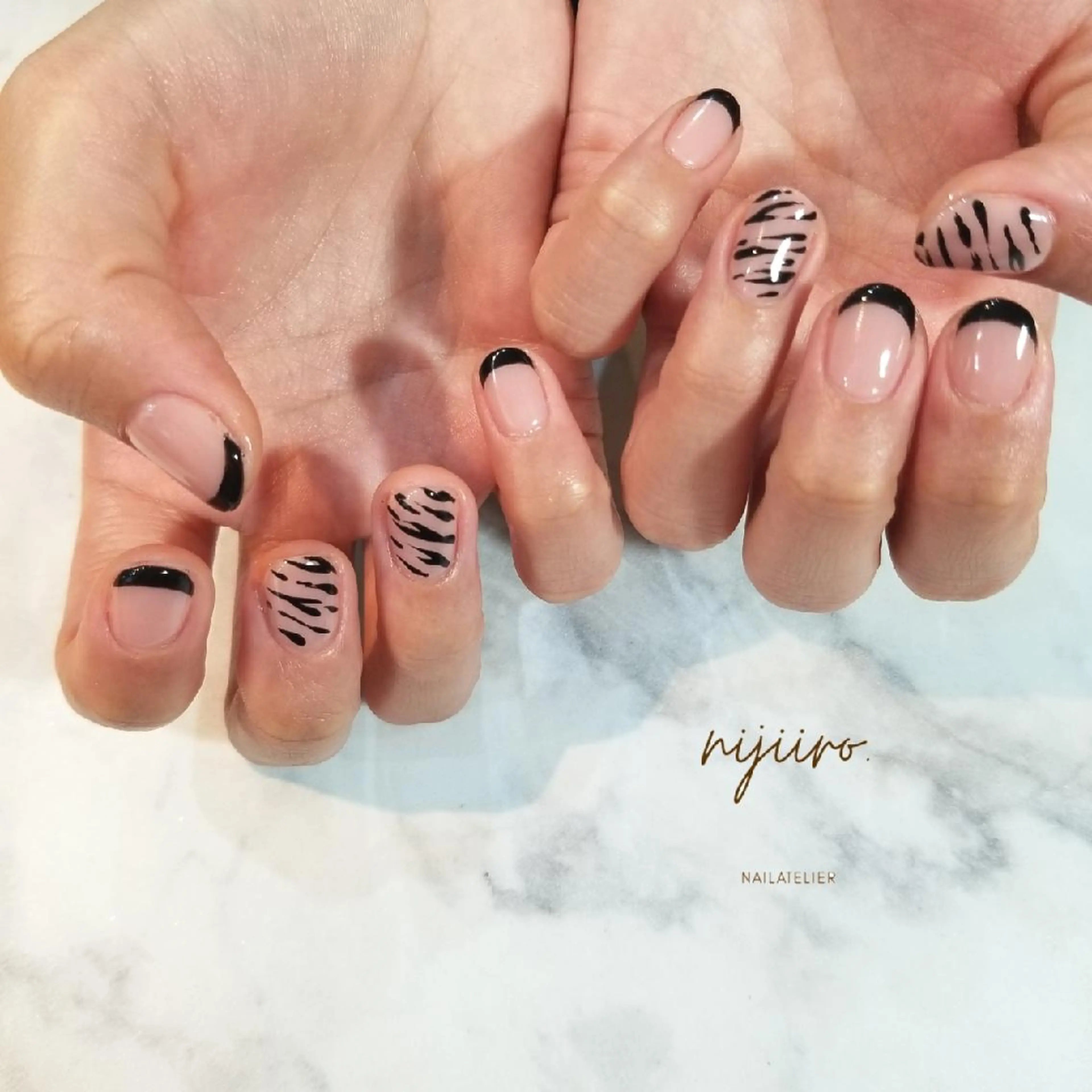 ネイル アニマル柄 フレンチネイル ハンドネイル nailatelier nijiiro.所属・nijiiro🌈 サトウのネイルデザイン