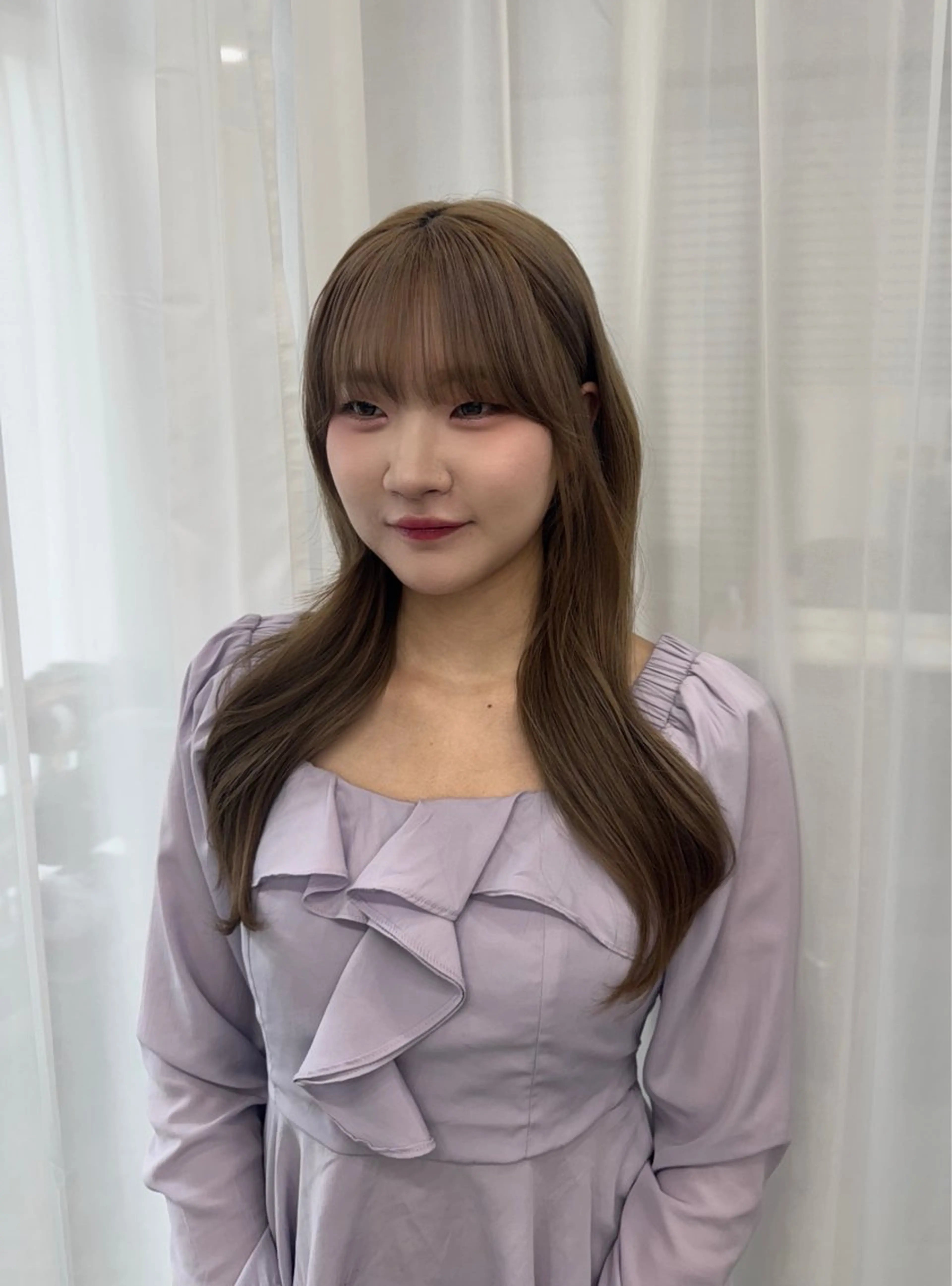 【韓国風】巻き下ろしヘアの写真