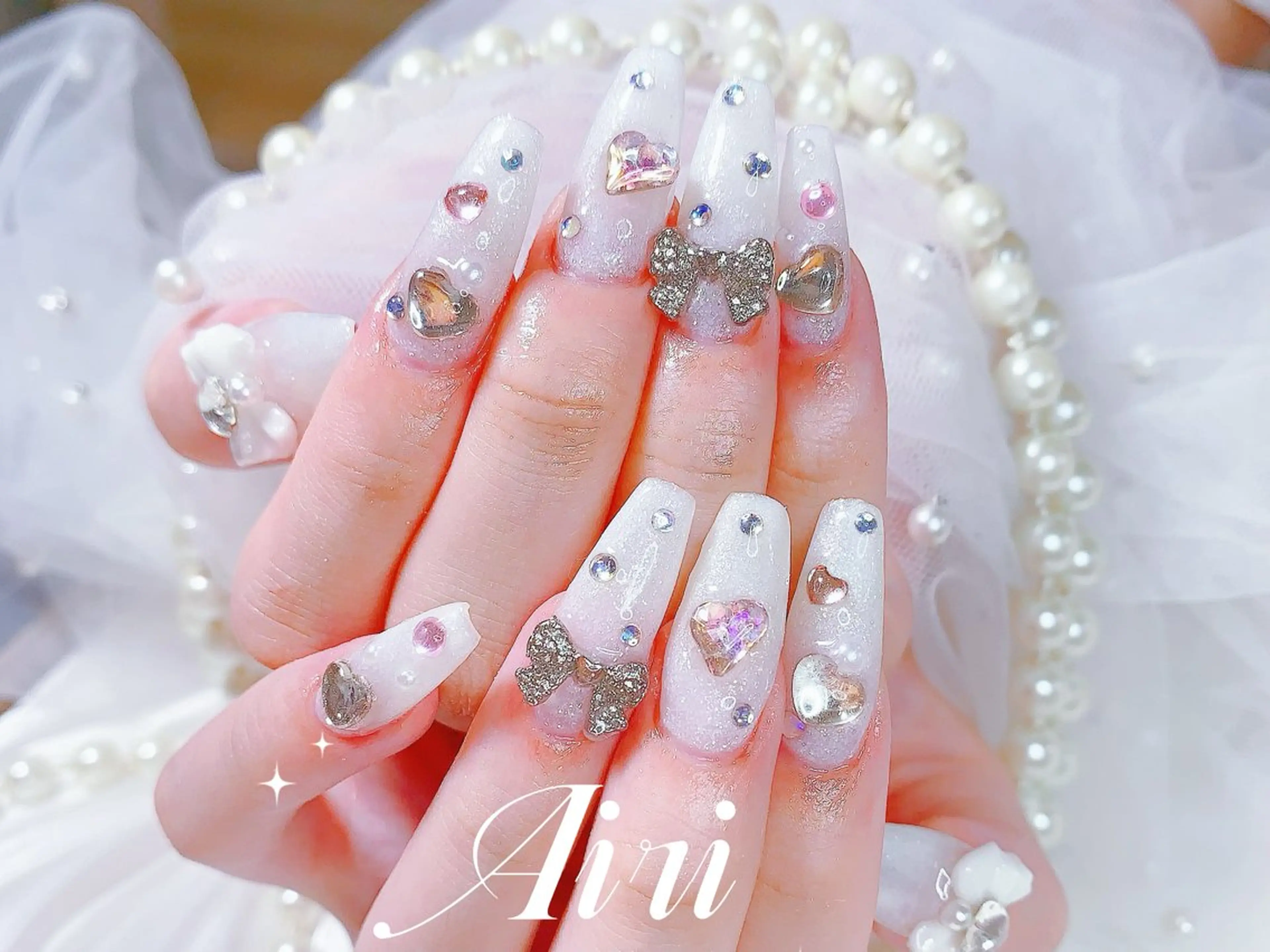 ネイル ハンドネイル ネイルサロンAiri 長さ出し·シンプルのネイルデザイン