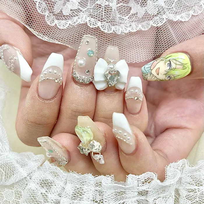 リボン¥880 ストーンチェーン¥330 リボンピアス¥880 中ハートスワロ