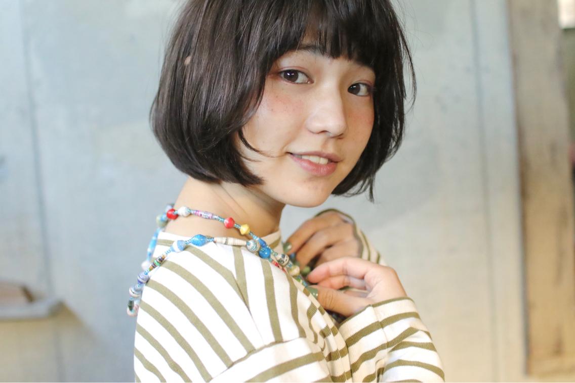 ナチュラルなかわいいボブ** 暗めで重い印象もカットで柔らかく軽く