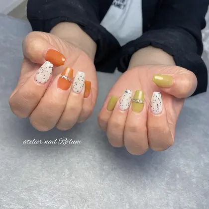 オレンジネイル ピスタチオネイル ダルメシアンネイル リングネイル Atelier Nail Re Lum所属 Atelier Nail Relumの ネイルデザイン ミニモ