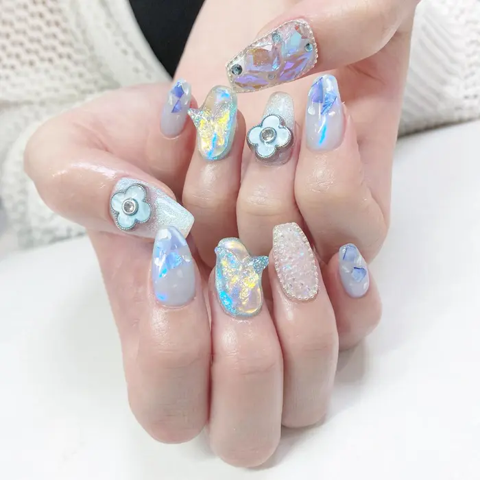 水色キラキラネイル 1部有料パーツ Minami Nail所属 Haruka のネイルデザイン ミニモ