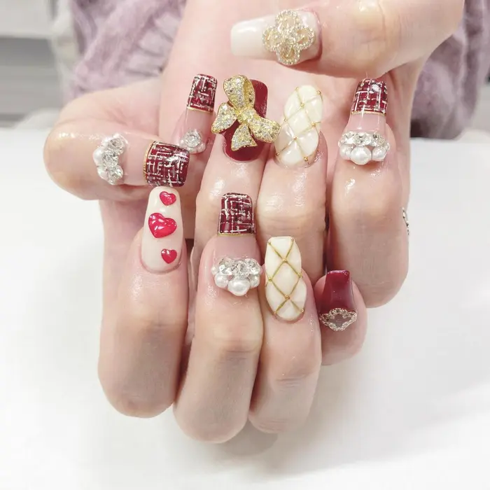 赤白ゴールド 1部有料パーツ Minami Nail所属 Haruka のネイルデザイン ミニモ