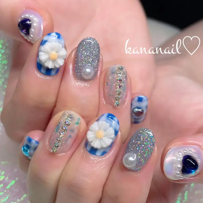 ボリュームコース ギンガムチェックネイル チェックネイル ブルーネイル Bluenail Angelaurakananail所属 Kananail Angelauraのネイルデザイン ミニモ