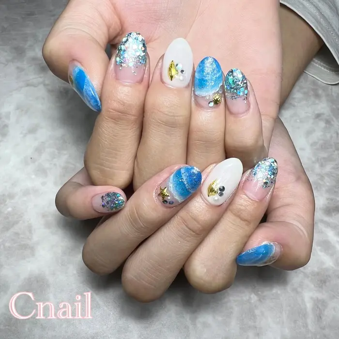 海ネイル 夏は 海ネイルが人気です C Nail所属 C Nailのネイルデザイン ミニモ 海ネイル 夏は 海ネイルが人気です C Nail所属 C Nailのネイルデザイン ミニモ