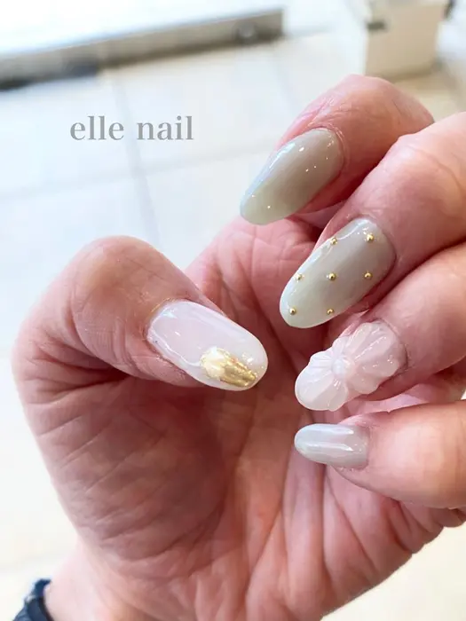 ぷっくりフラワー 春らしい爽やかなカラーとお花が可愛い Nails Un Bijou所属 Elle Nailのネイル デザイン ミニモ