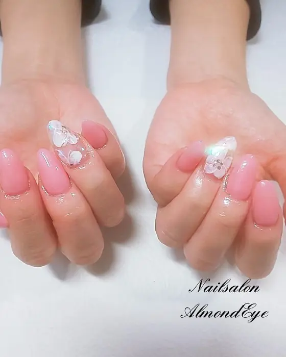 お客様ネイル 春カラーにお花のアートが可愛いネイル ﾟ 美爪がより美しく Nailsalon Almondeye所属 ネイルサロン Almondeyeのネイルデザイン ミニモ