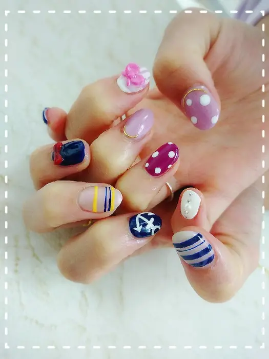 ドナルド デイジーモチーフのお客様持ち込みネイル Nail221b所属 塚越 千夏のネイルデザイン ミニモ